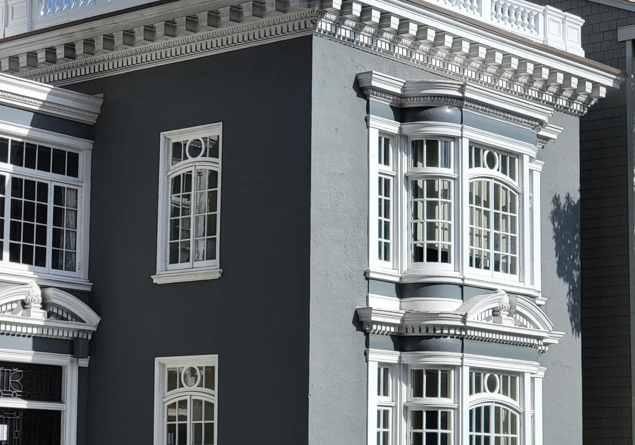 Commercial painting professionals coating a building in San Francisco, CA.